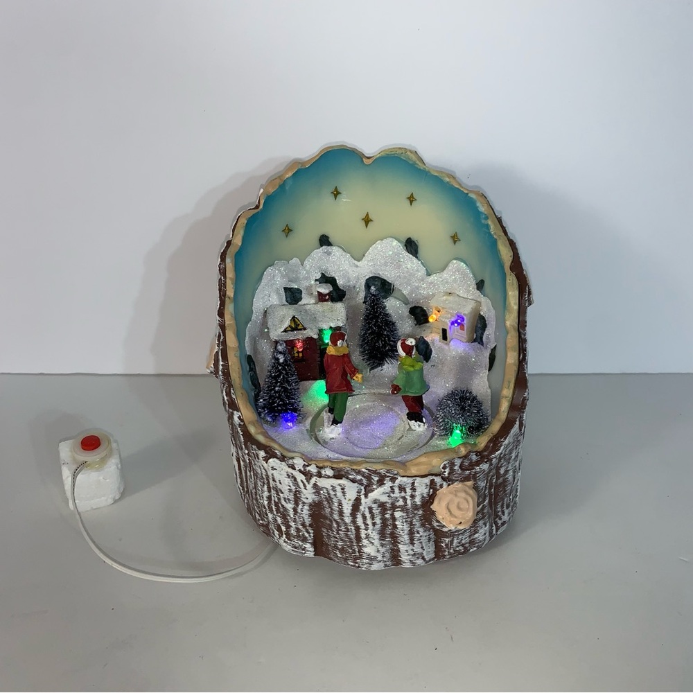 Pan Asian Creations Skating Rink Animated Christmas Musical Light Decoration